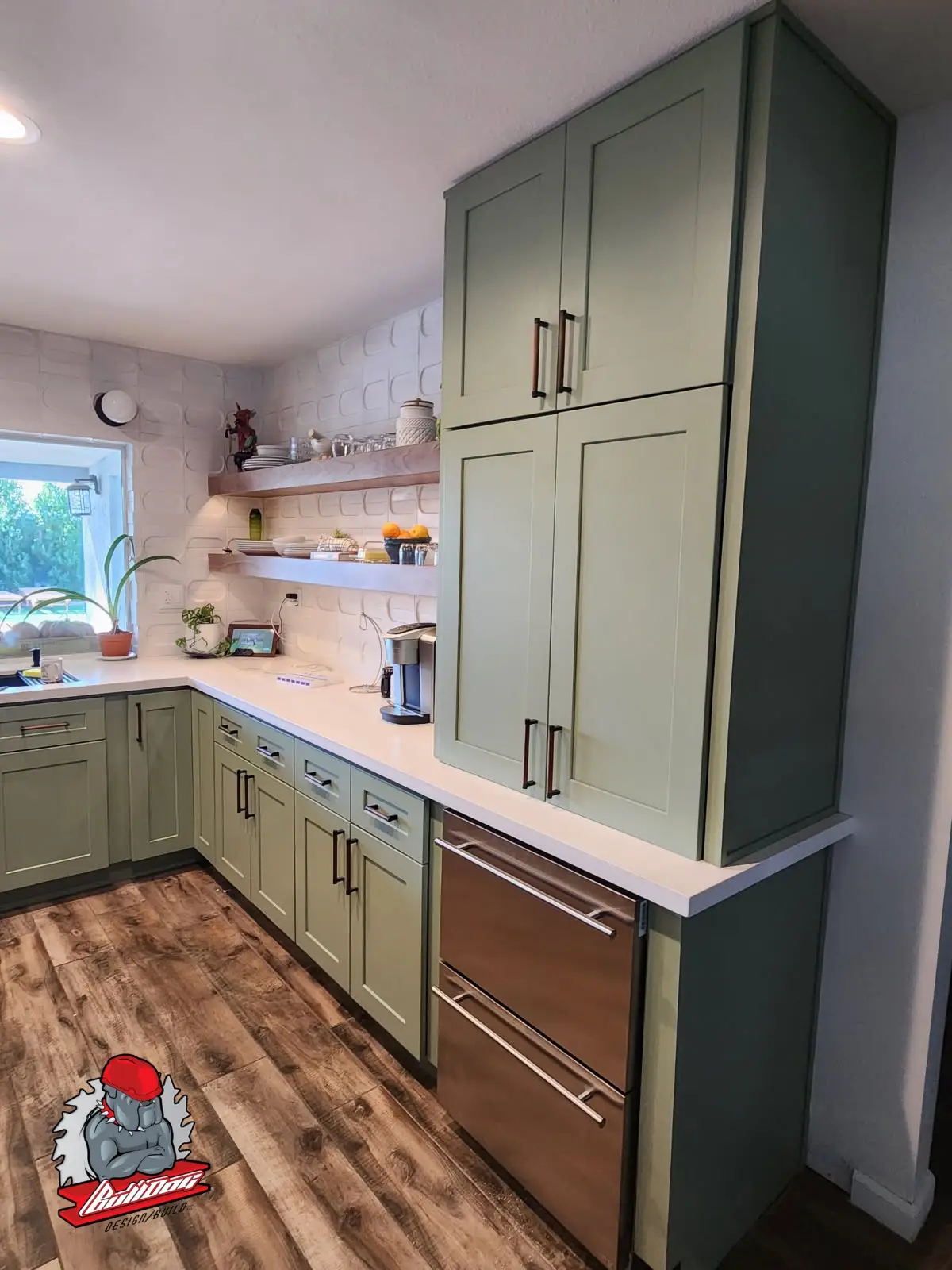 Sage green kitchen remodel with walnut floating shelves
